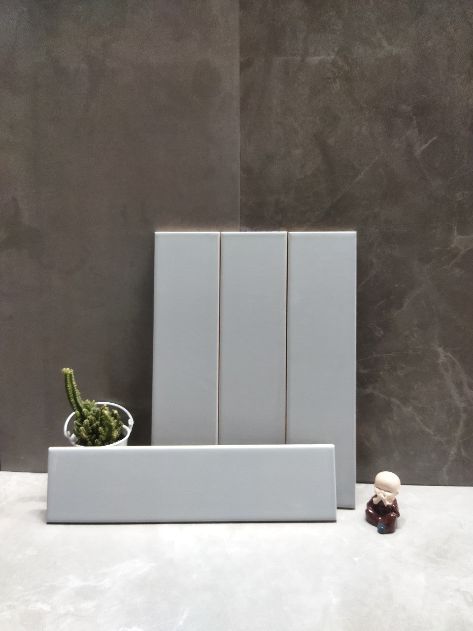 Gạch thẻ 75x300mm xám xanh mờ phẳng mã 68633