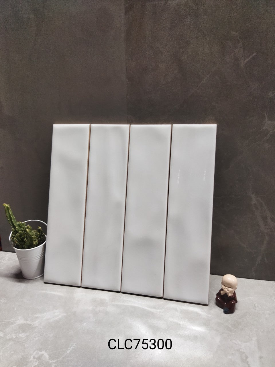 Gạch thẻ Trắng bóng lượn KT 75x300mm CL75300