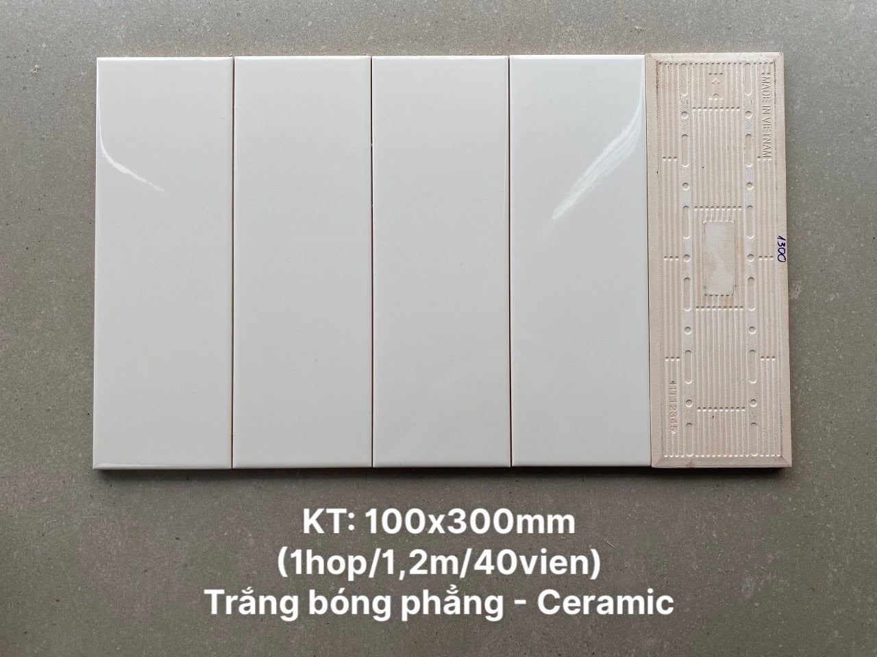 Gạch thẻ Việt Nam trắng bóng phẳng  KT 100x300mm loại 1 mã STA1300