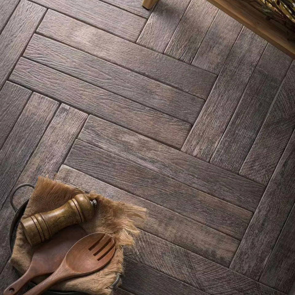 Gạch lát nền gốm họa tiết xương cá vân gỗ màu xám giả cổ cao cấp
