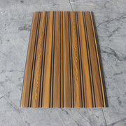 Tấm ốp PVC vân sáo phủ nhựa đen nội thất