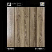 Gạch lát nền họa tiết vân gỗ màu nâu nhạt, kích thước 200x1000mm, có hoa văn tự nhiên.