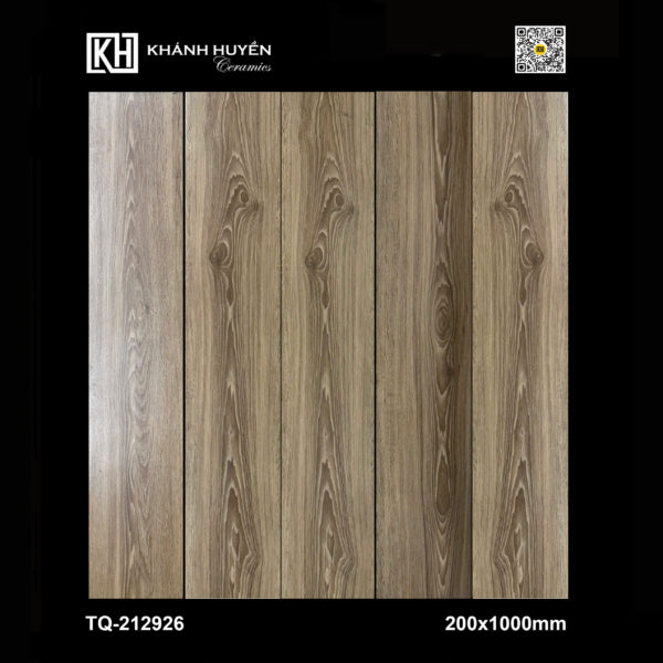 Gạch lát nền họa tiết vân gỗ màu nâu nhạt, kích thước 200x1000mm, có hoa văn tự nhiên.