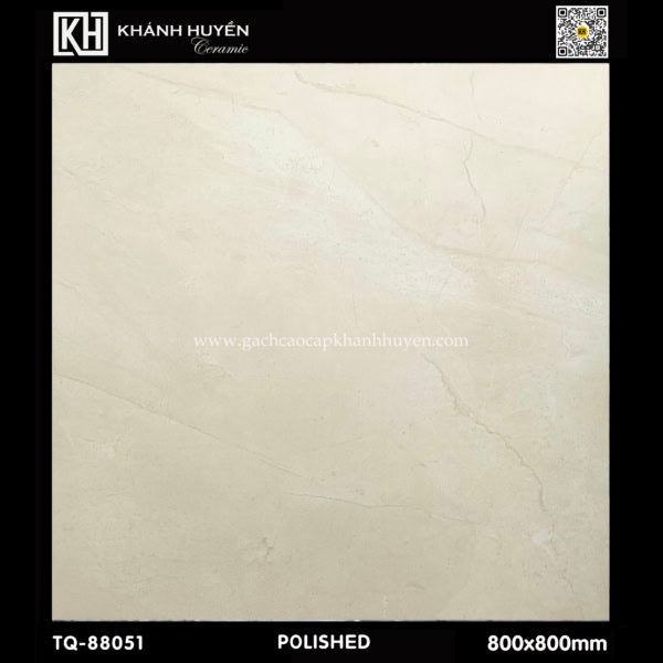 Gạch men bóng màu kem nhạt, kích thước 800x800mm, có vân mờ và logo Khánh Huyền.
