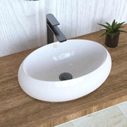 Chậu rửa mặt hình bầu dục đặt trên bàn trang điểm