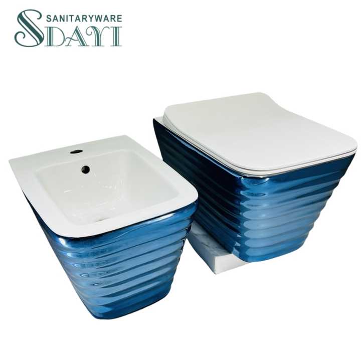 Bồn cầu treo tường hai mảnh bằng gốm sứ SDAYI Ware mạ vàng bạc sang trọng màu vàng và trắng cho phòng tắm hiện đại