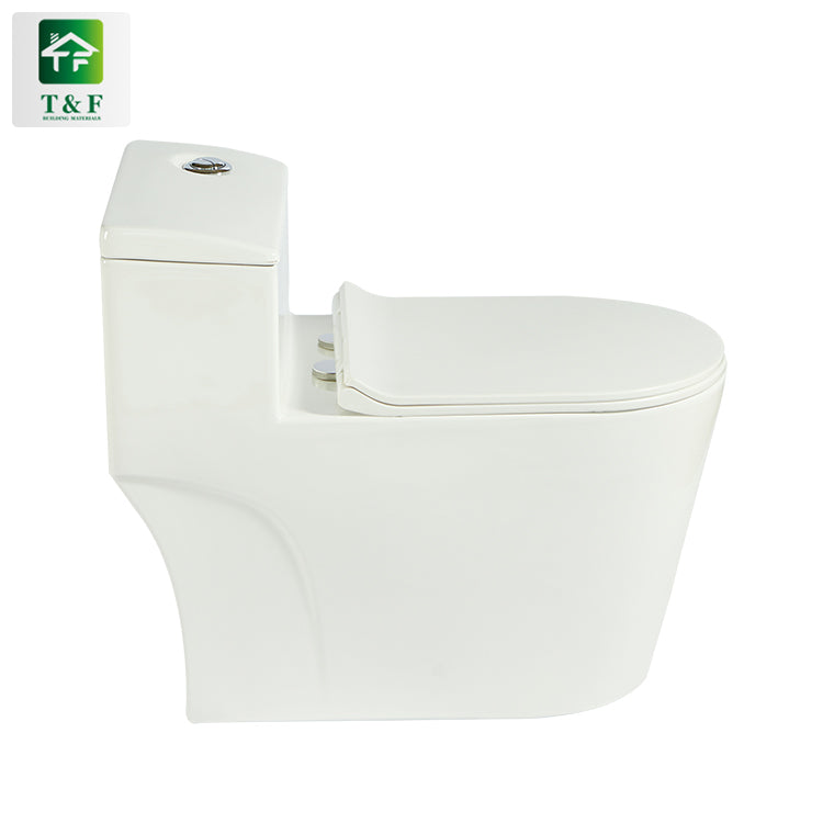 Bồn cầu sứ nguyên khối đặt sàn xả xi phông, kiểu dáng phòng tắm, giá rẻ xuất xưởng.