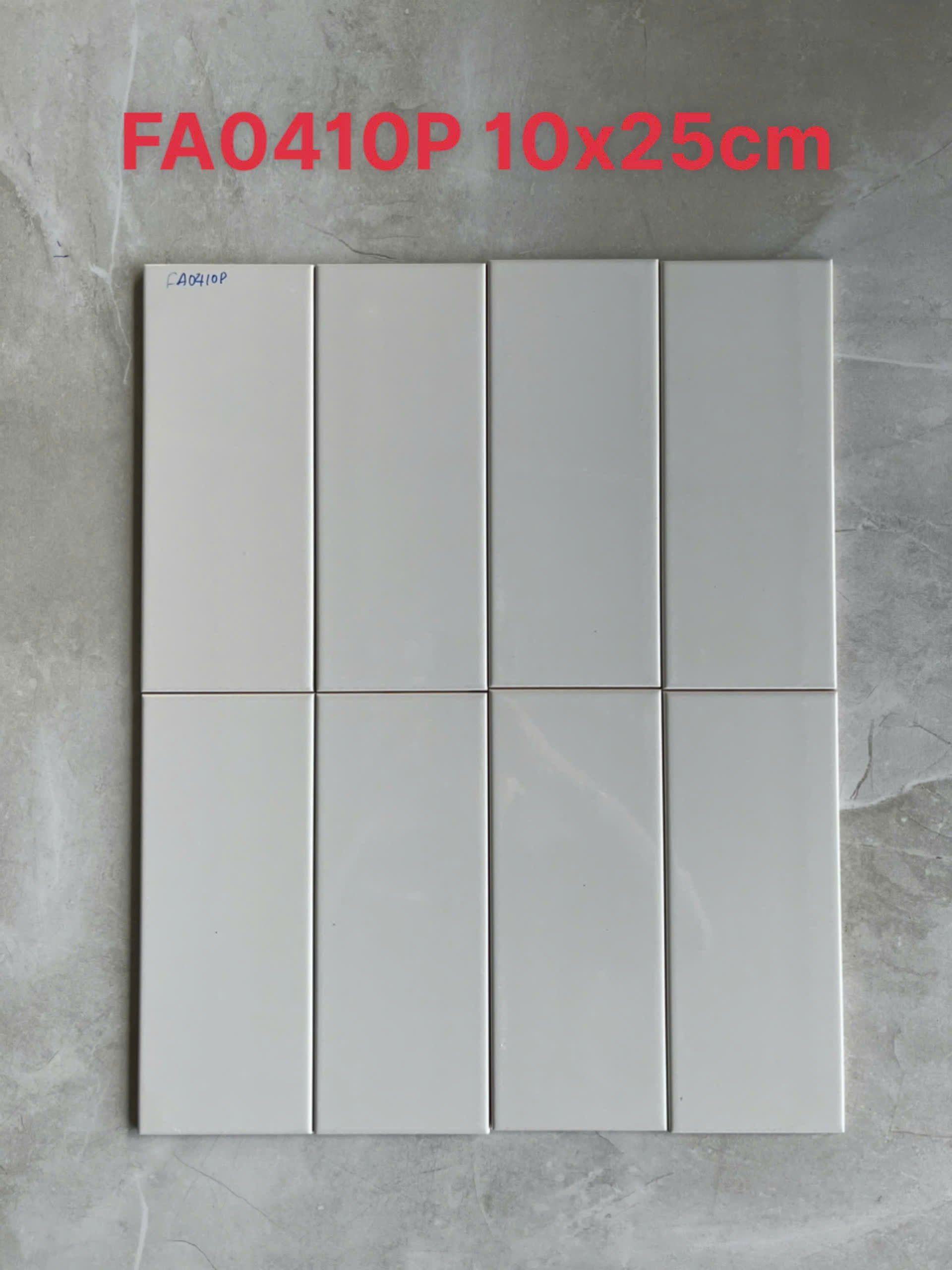 Gạch thẻ Việt Nam KT 100x250 xám bóng phẳng loại 1 mã FA0410P