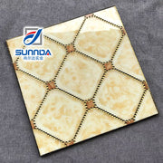 Gạch Lát Sàn Sứ Porcelain Vân Thảm Bề Mặt Bóng Tráng Men Mạ Vàng Họa Tiết Hoa Lá Tùy Chỉnh Chất Lượng Phật Sơn 600x600 - Daisan Store