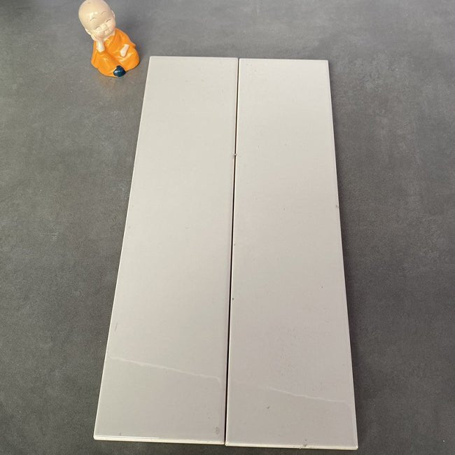 Gạch thẻ cao cấp xám nhạt bóng phẳng 75x300 mã PSTA75303 - Daisan Store