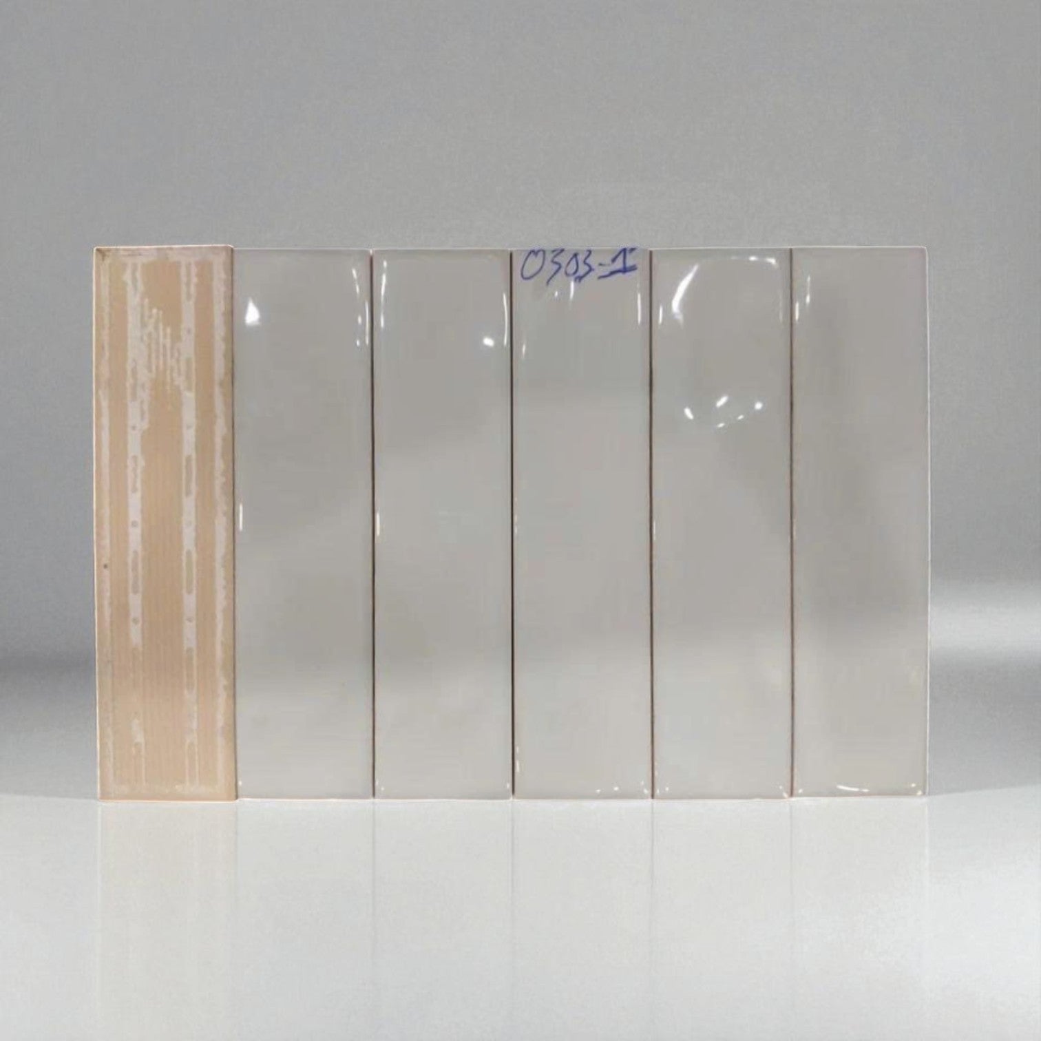 Gạch thẻ Việt Nam 75x300mm xám bóng lượn mã 0303-1(GR031PM) loại 1